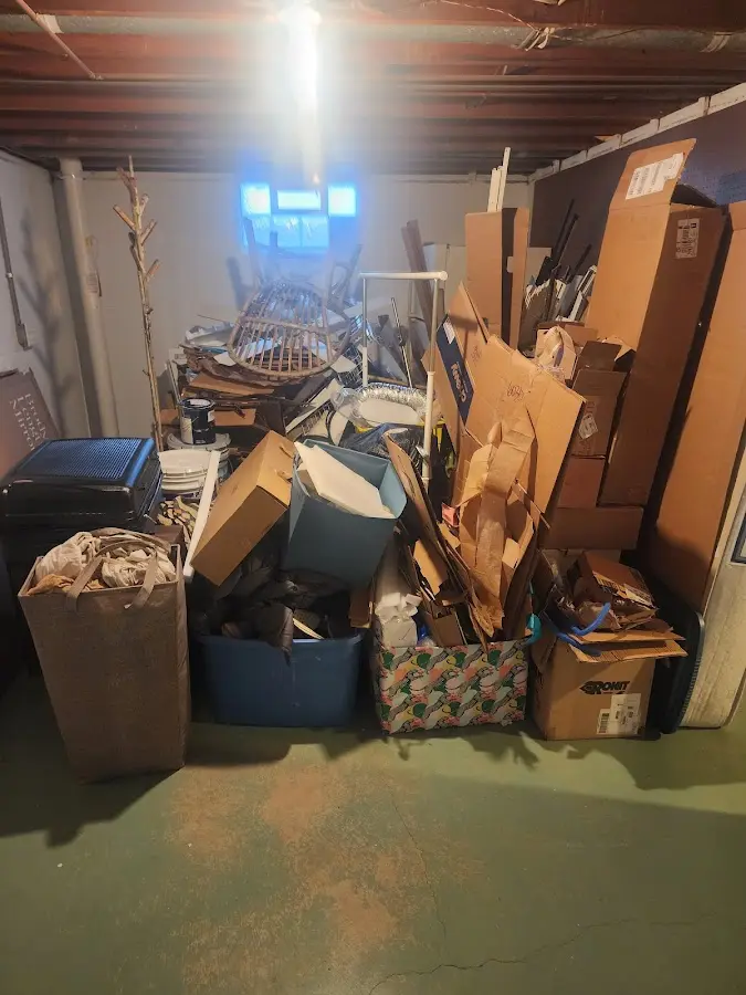 Roll-off dumpster container at job site for 2 Yard Dumpster Rental in Grosse Ile